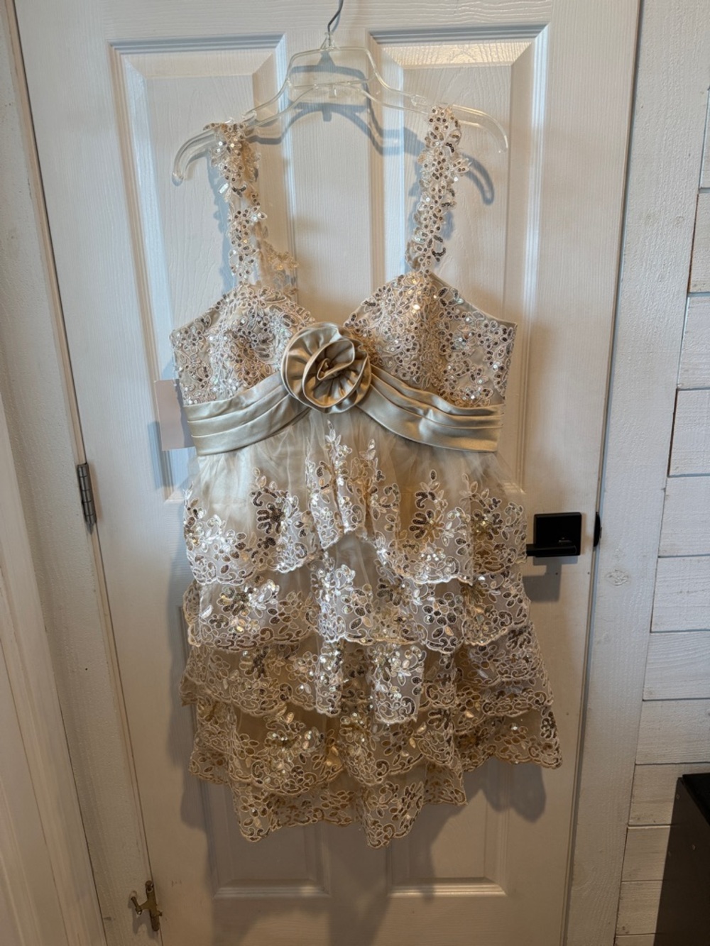 Elegant Cream Lace Tiered Mini Dress with Floral Rosette